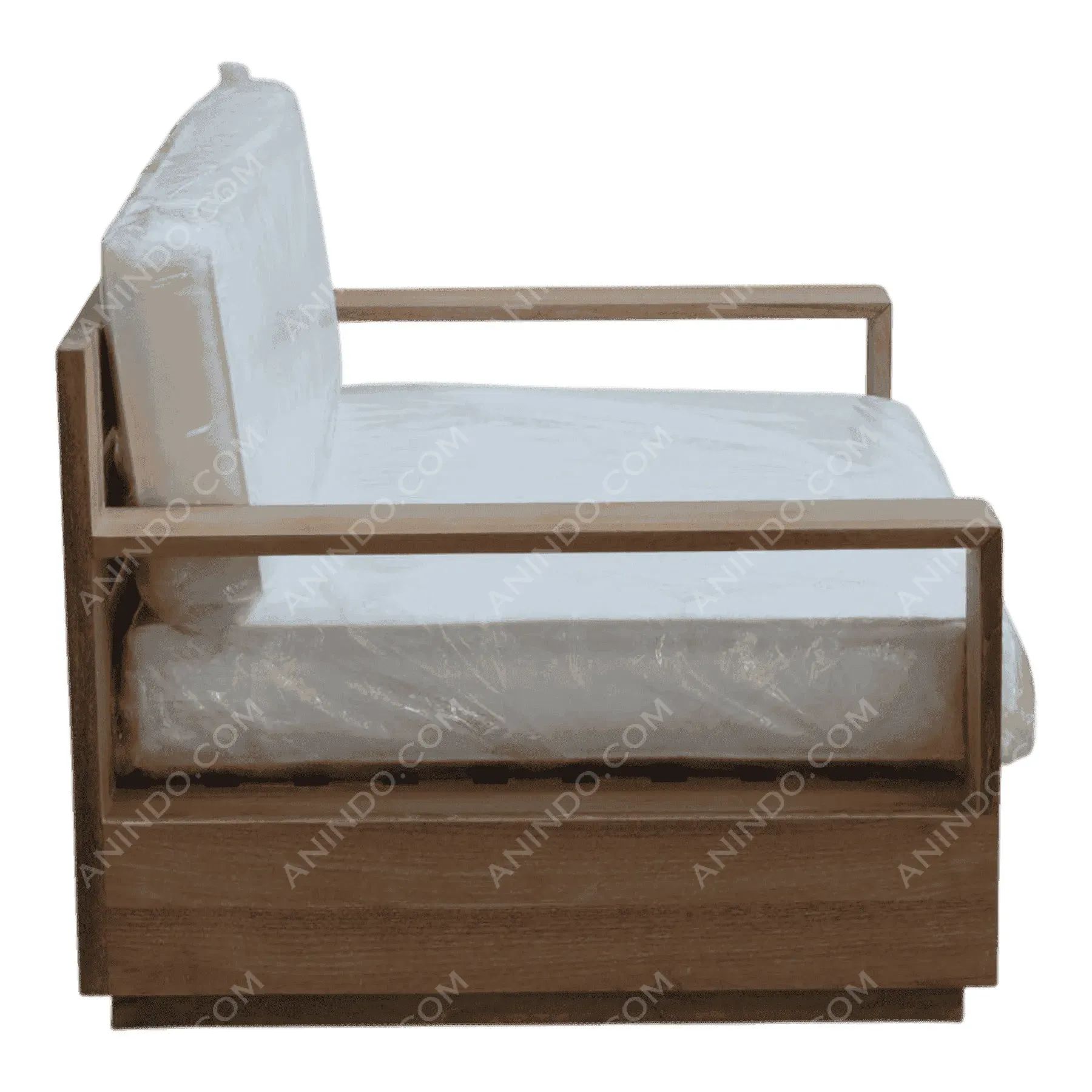 Wooden armchair with white cushions side view