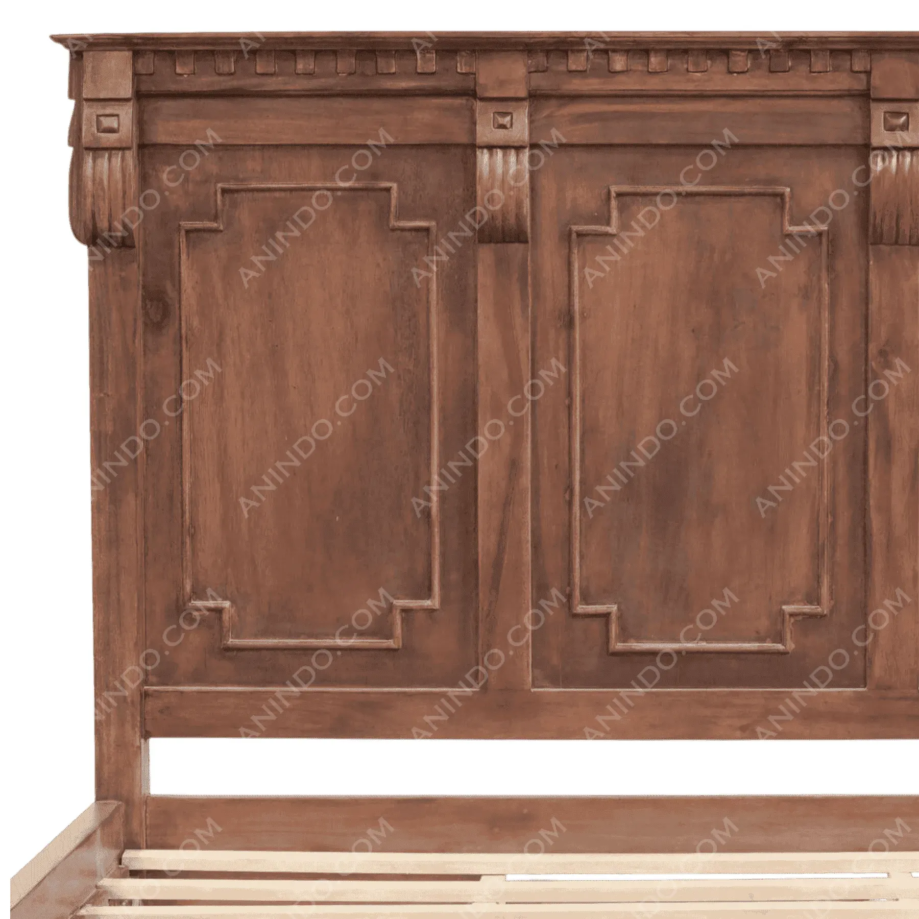 Vintage wooden bed headboard with carved details