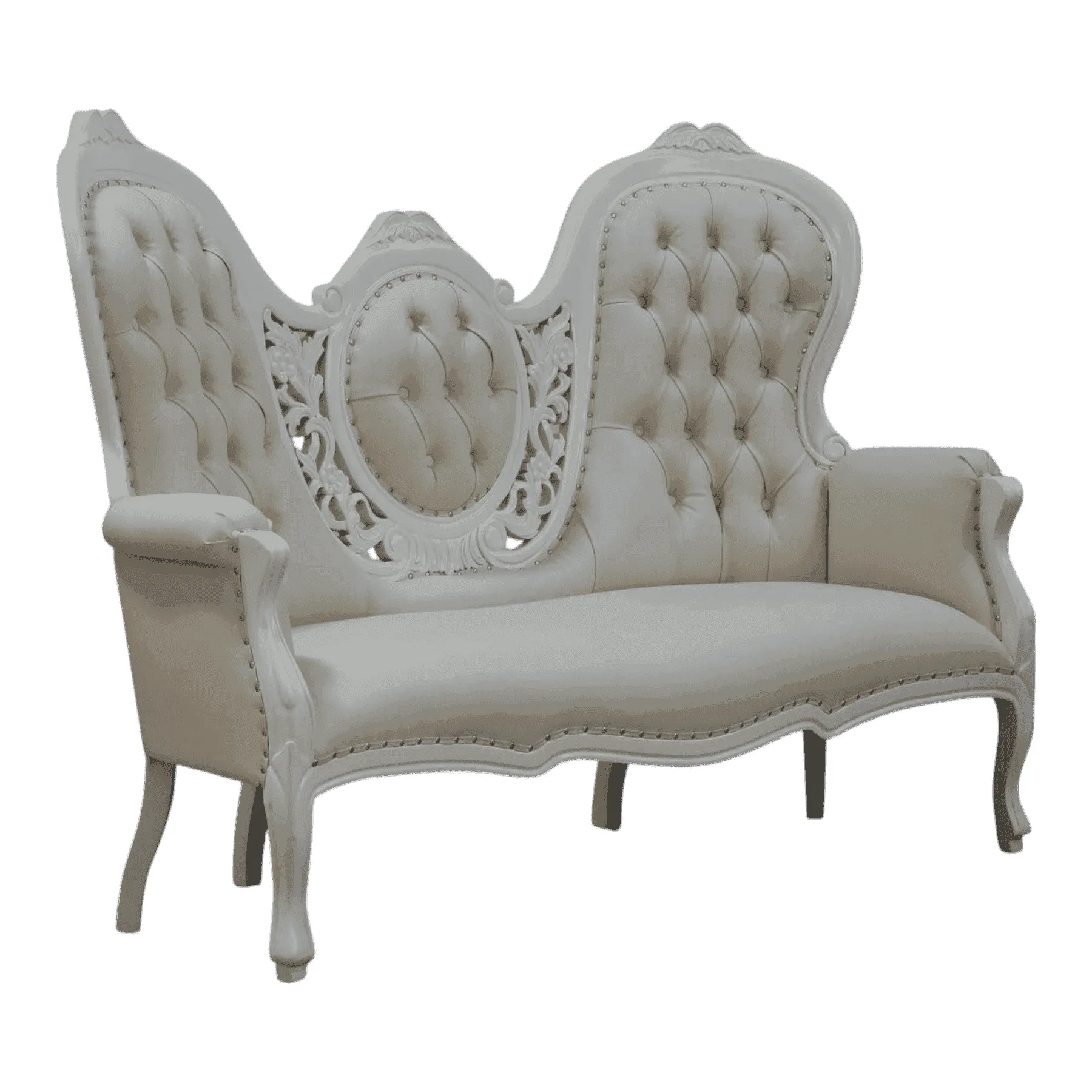 Elegant tufted vintage cream sofa with carved wood