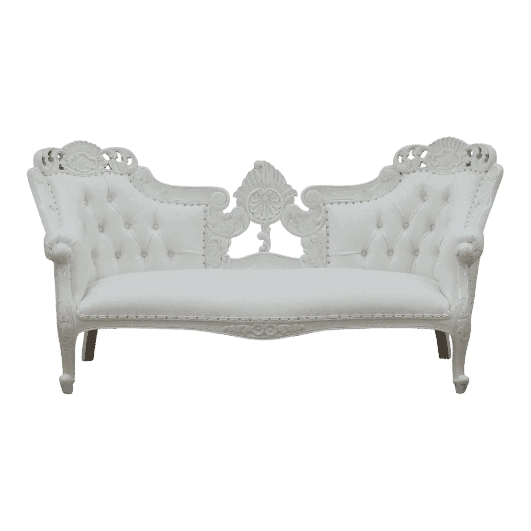 White vintage tufted loveseat with ornate wood carvings