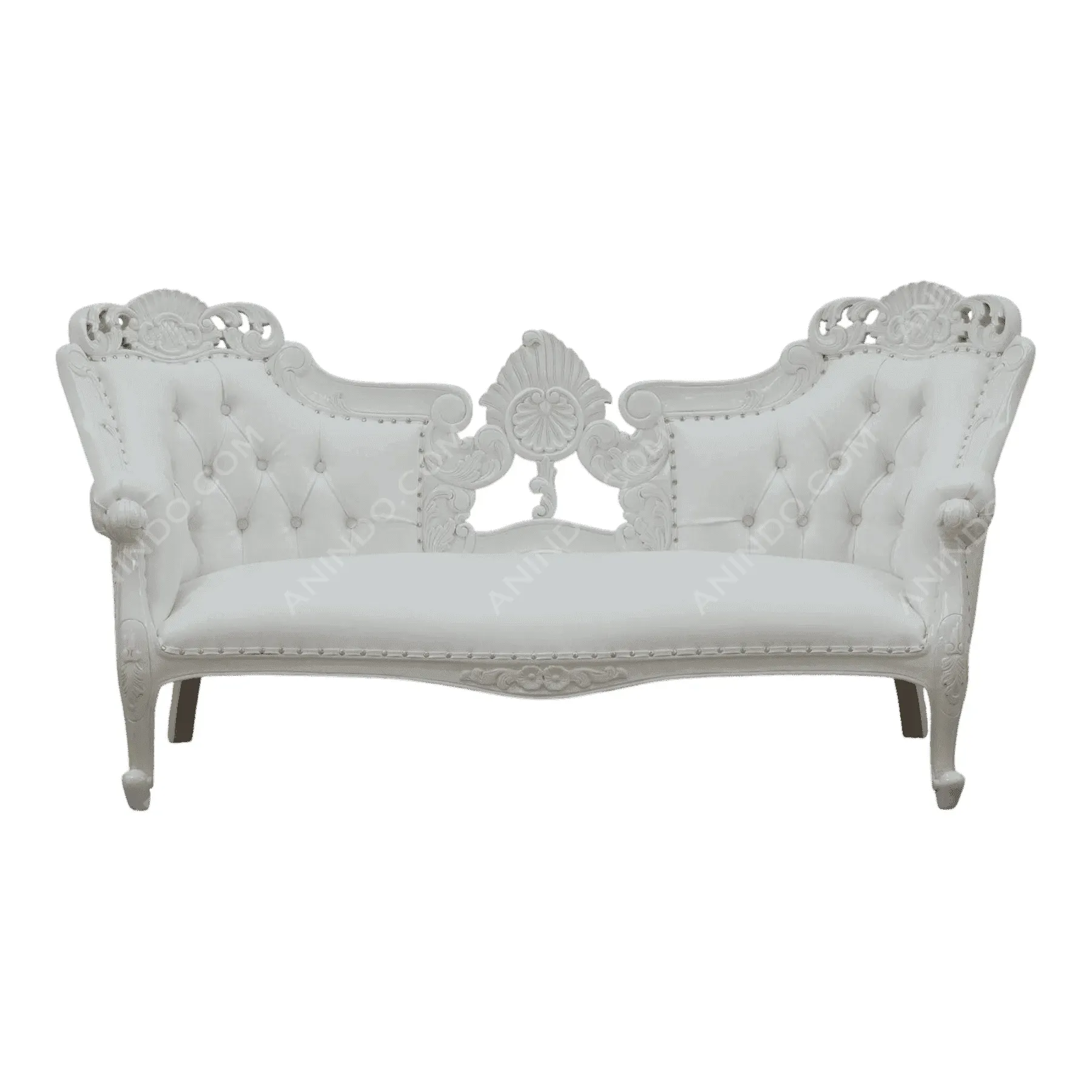 White vintage tufted loveseat with ornate wood carvings