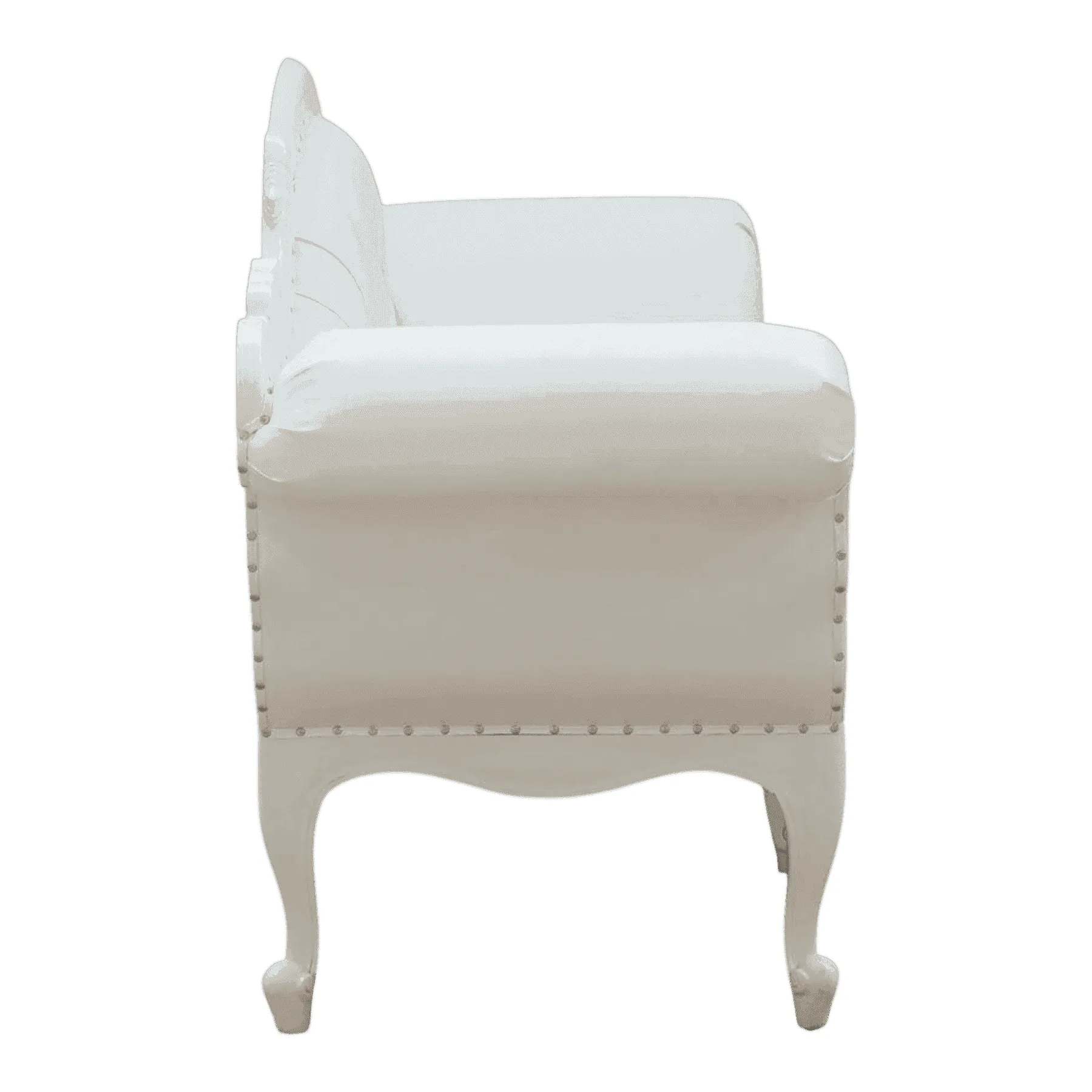 White upholstered vintage armchair side view