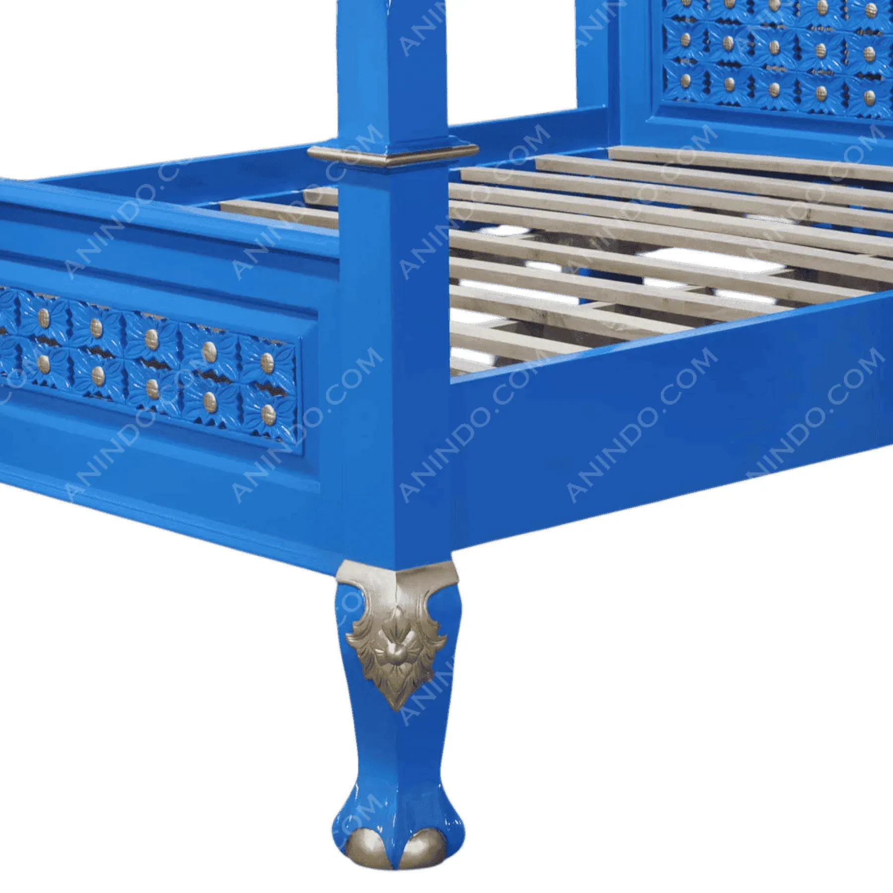 Blue wooden bed frame with ornate silver details