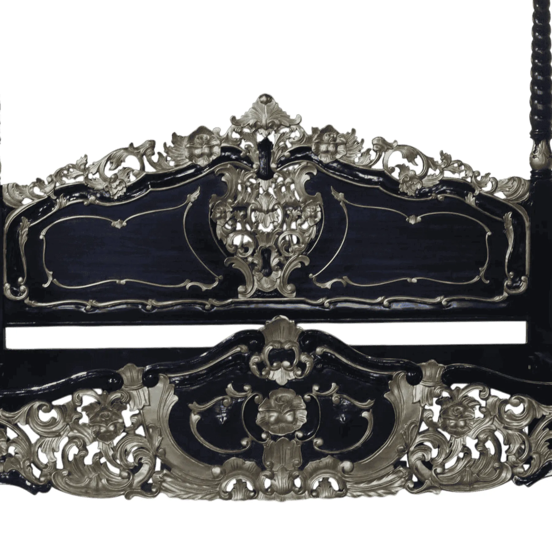 Ornate antique wooden bed frame with intricate carvings