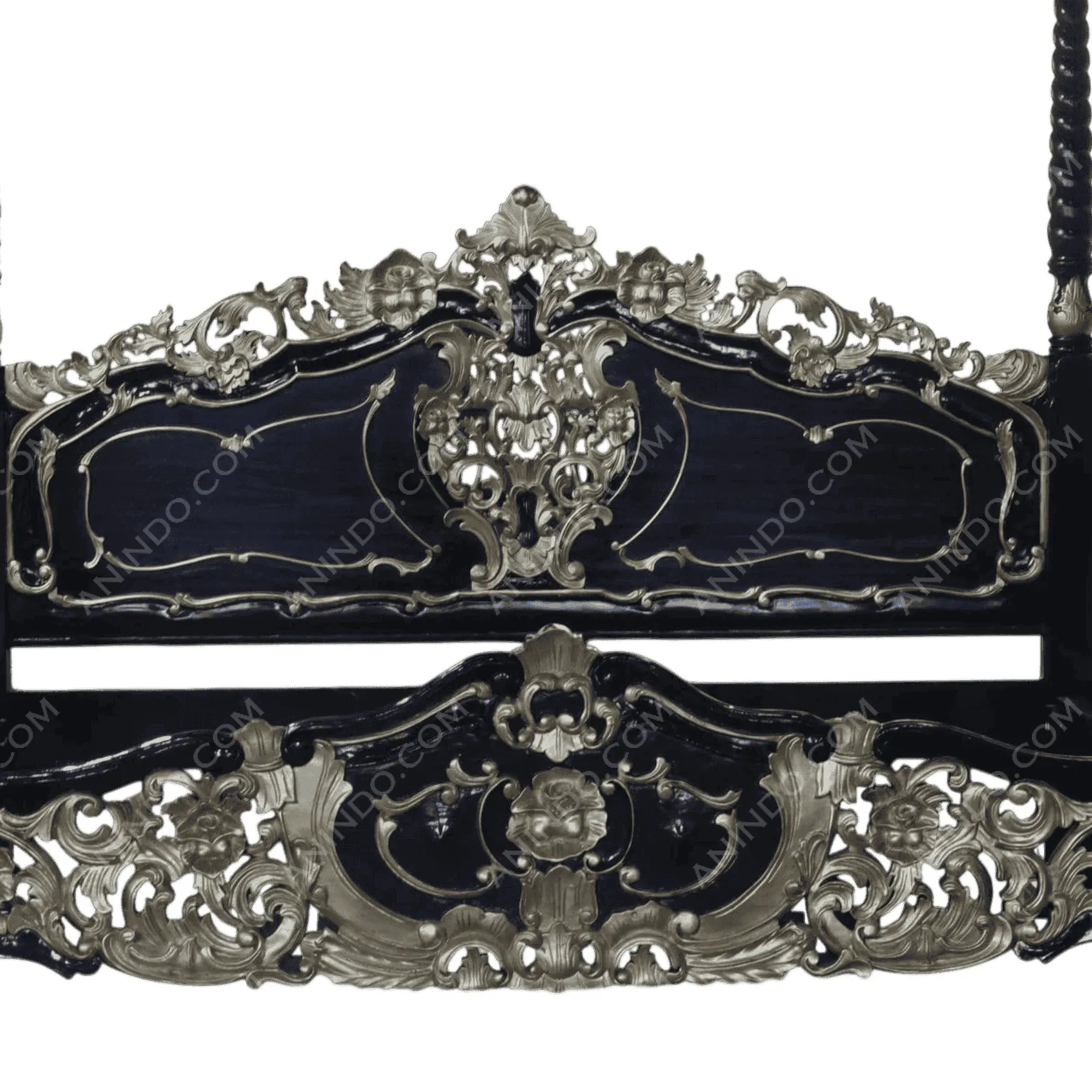 Ornate antique wooden bed frame with intricate carvings