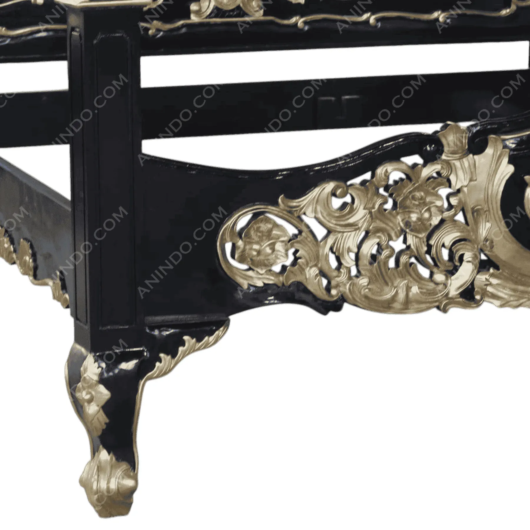 Black and gold ornate carved furniture leg