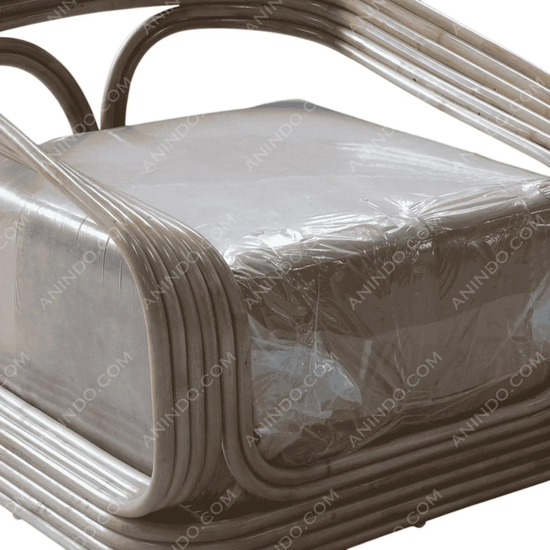 Wrapped rattan furniture with plastic cover