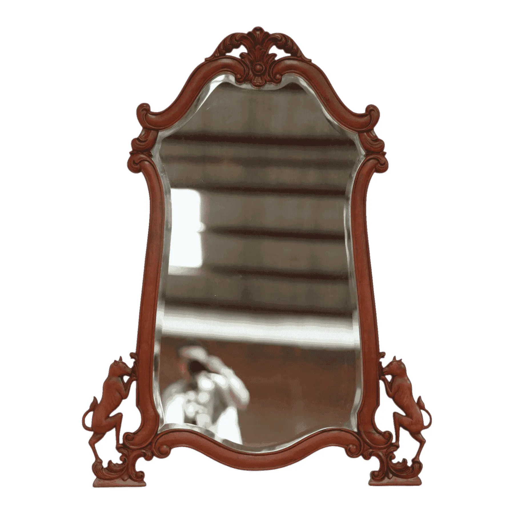 Ornate vintage wooden framed mirror with decorative carvings